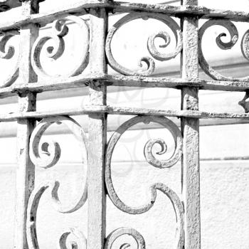  in the white concrete wall and     shadow black balauster acces abstract handrail