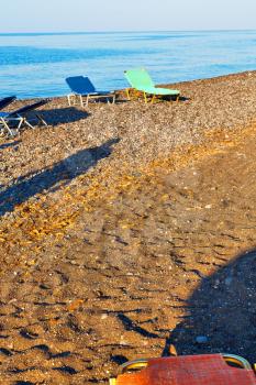 in      greece  the  mykonos  island rock sea and beach    sky
