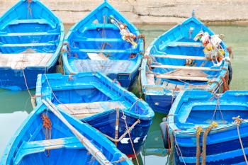   boat and sea    in africa morocco old castle brown brick  sky pier
