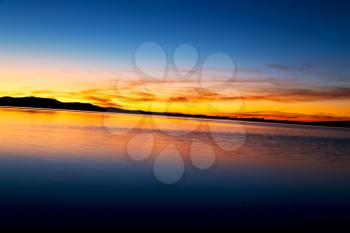 blurred in morocco africa the   sunlight of sunset   a lake near  desert