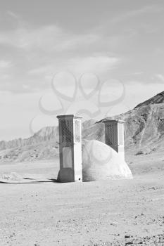 blur in iran near yazd the antique zoroastrian temple abandonated house and contruction