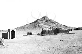 blur in iran near yazd the antique zoroastrian temple abandonated house and contruction