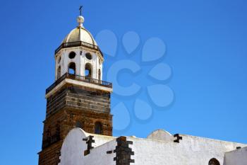 in teguise  arrecife lanzarote  spain the old wall terrace church bell tower  
