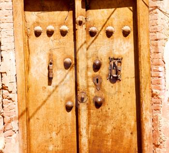 blur in iran old door near the mosque and antique construction