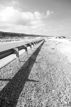 in oman old asphalt road near the coastline 