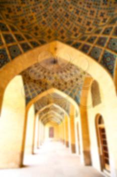 blurred  in iran shiraz the corridor passage old mosque and wall arch for islm religion