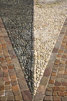 in mozzate  street lombardy italy  varese abstract   pavement of a curch and marble