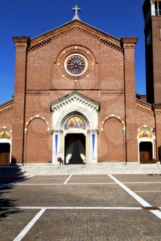 in  the  castellanza  primo  old   church  closed brick tower sidewalk italy  lombardy   