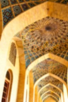 blurred  in iran shiraz the corridor passage old mosque and wall arch for islm religion