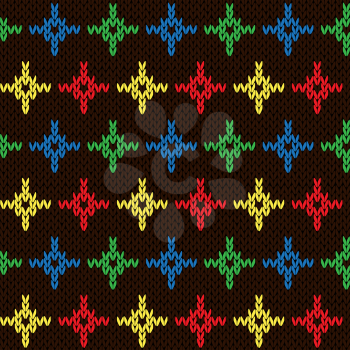 Seamless knitting geometrical vector pattern with color crosses over dark brown background as a knitted fabric texture 