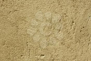 Fragment of new stucco with fine sand and cement close up