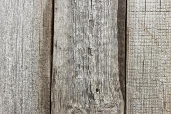 Three old wooden boards with erosion surface