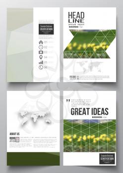 Set of business templates for brochure, magazine, flyer, booklet or annual report. Colorful polygonal floral background, blurred image, yellow flowers on green, modern triangular texture.