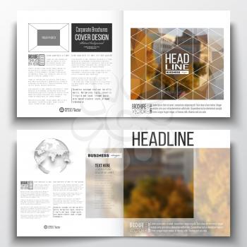 Set of annual report business templates for brochure, magazine, flyer or booklet. Polygonal background, blurred image, urban landscape, cityscape, modern stylish triangular vector texture.