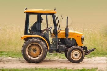 Farm tractor goes on road