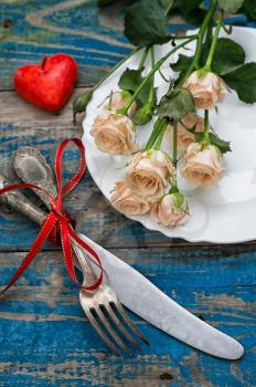 served table and cut roses for Valentine's day