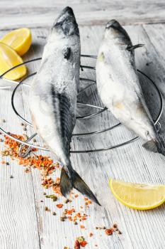 Two fresh mackerel marinated with spices and lemon juice
