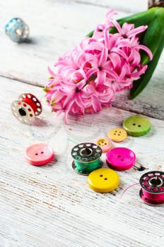 Pink hyacinth and tools for making jewelry for spring