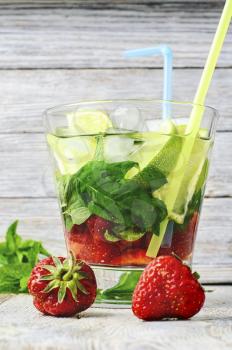Popular summer  cocktail with rum,lime and mint.