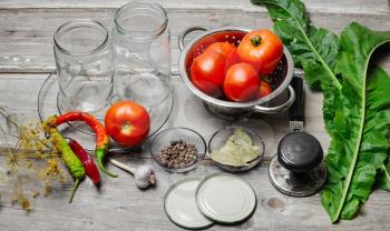 Tomato,spices and cooking utensils for pickling vegetables