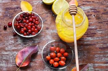 Autumn remedy with honey,rose hips and cranberries