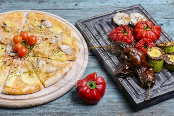 Pizza with beef and roasted red pepper with eggplant