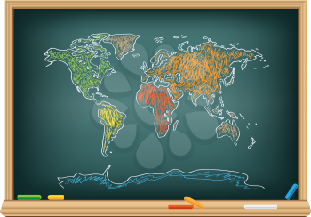 Drawing world map by a chalk on the classroom blackboard