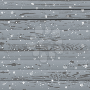 Christmas snow gray wooden background. Winter snowflakes wood backdrop