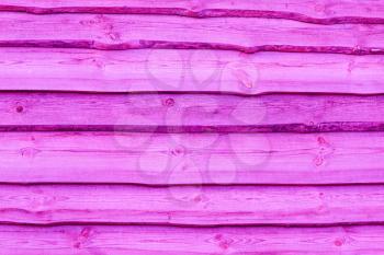 Pink wooden boards background. Wall floor or fence exterior design. Natural wood material backdrop