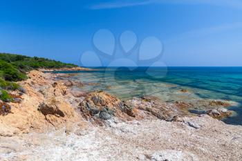 Coastal landscape with rocky wild beach, Corsica, France. Plage De Capo Di Feno