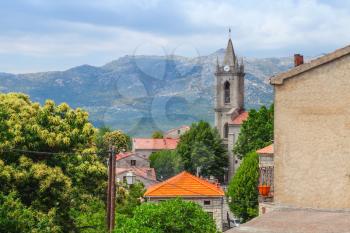 Corsican village landscape, old houses and bell tower. Zonza, South Corsica, France