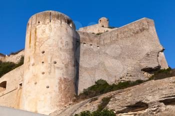 The citadel at Bonifacio above deep blue sky background, Corsica island, France