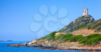 Ancient Genoese tower Parata on rocky cliff near Ajaccio, Corsica, France