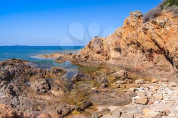 Coastal landscape with empty rocky wild beach, South region of Corsica island, France. Plage De Capo Di Feno