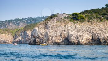 Coastal landscape with rocky coast of Capri island, Mediterranean Sea, Italy
