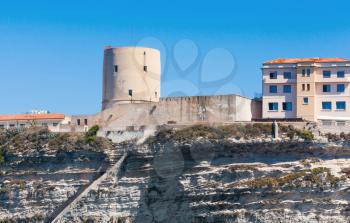 Old fort tower on the rocky coast. Bonifacio, Corsica island, France