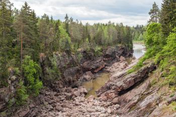 Dry stone riverbed of Vuoksa river. Imatra, Finland