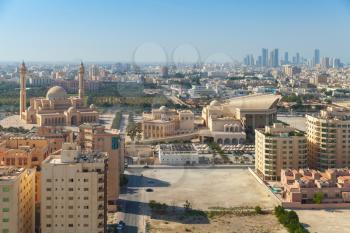 Bird view of Manama city, Bahrain. Skyline with old and modern buildings on the horizon
