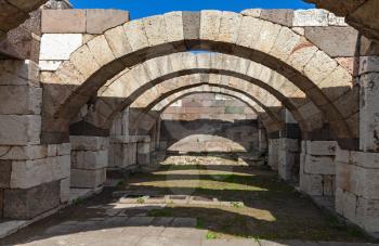 Interior of empty corridor with arcs. Ruins of Ancient city Smyrna. Izmir, Turkey