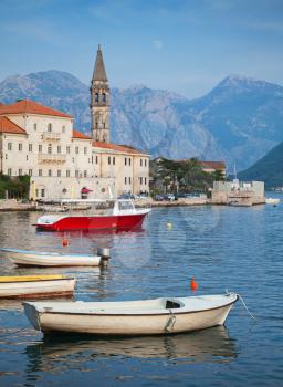 Landscape with boats. Old Perast town, Kotor bay, Montenegro