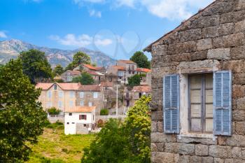 Aullene village, Corsica, France. Street view with old stone living houses