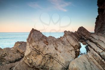 Coastal rocks and sky on Adriatic seacoast. Montenegro