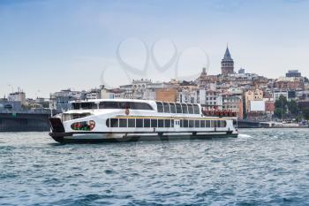 Passenger ferry goes on Golden Horn, Istanbul. It is a major urban waterway and the primary inlet of Bosphorus