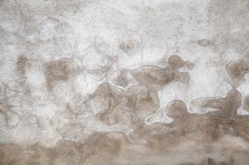 Dark gray concrete wall with wet pattern, grungy background photo texture