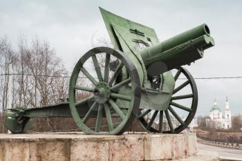 Old green cannon, military monument in Kingisepp, Russia