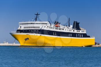 Yellow passenger ferry moored in port of Zakynthos, Greek island in the Ionian Sea