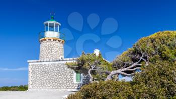 Skinari Lighthouse in summer season. It was manufactured in 1897, located In Zante Island near Korithi above Cape Skinari