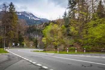 Turning mountain highway in spring season. Switzerland, Alps