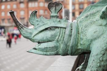 Detail from the basin edge of Dragon Fountain located in the City Hall Square in Copenhagen, Denmark. It was inaugurated in 1904
