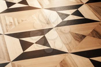 Old wooden parquet design, geometric pattern with squares. Background photo texture
